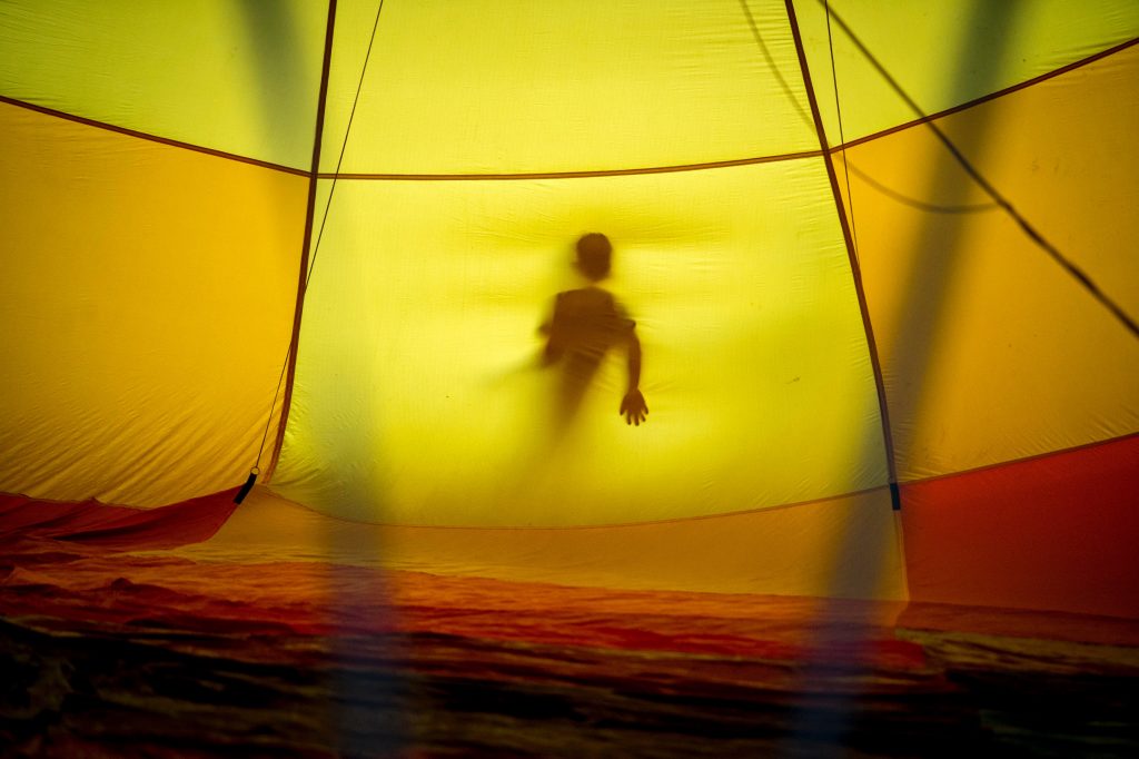 person in tent
